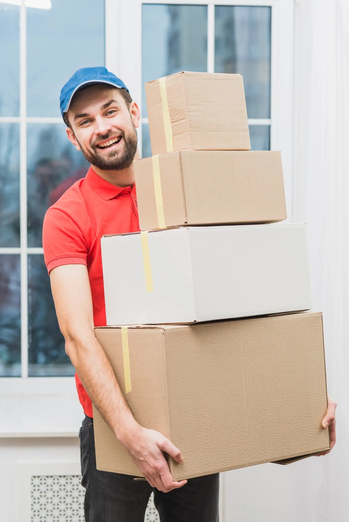 cheerful-delivery-man-with-parcels